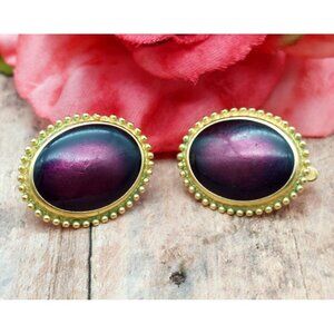 TRIFARI TM Gold Tone Oval Clip On Earrings Textured Trim Purple Plum Center 1"
